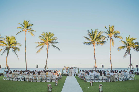 Breezy Seaside Wedding Ceremony and Reception Designed to Capture the Essence of the Famed Jet-Set Beach Clubs of the Greek Islands